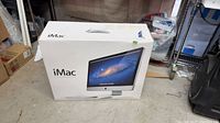 Retail box front showing iMac image and branding