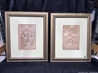 Both framed portrait prints side by side showing matching frames and mats