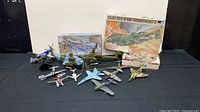 Group shot showing boxed kits and assembled aircraft
