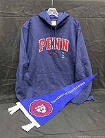 Full view of Nike hoodie and pennant