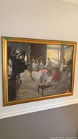 Full view of framed Degas ballet scene print on wall