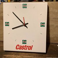 Front view showing full clock face and branding