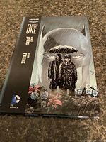 Front cover showing title Batman Earth One, artwork and DC Comics logo