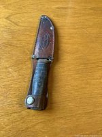 Knife in sheath closed