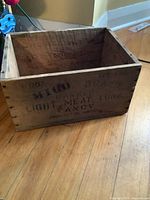 Angled view showing exterior stencil text and construction