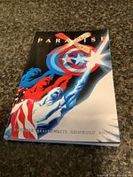 Front cover showing title "Paradise" with Captain America shield and creator credits