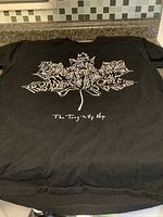 Full view of front graphics on black T-shirt