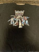 Full T-shirt laid flat showing entire graphic