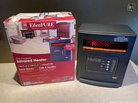 Heater beside original box showing model and condition