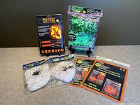 all six sealed Halloween décor items on table