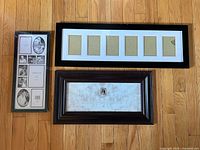 All three frames displayed on hardwood floor