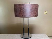 Full view of lamp with shade and base