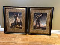 Both framed golf prints side by side