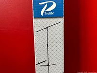 Front of retail box showing Profile branding and stand illustration