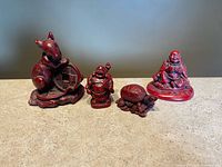 All four figurines front view