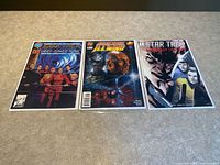All three bagged Star Trek first-issue comics side by side