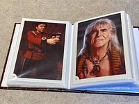 Open album showing cards #10 and #11 featuring Chekov and Khan