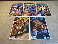 All five bagged Star Trek: Mission’s End issues laid out