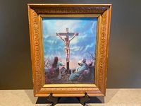 Full view of framed lenticular Crucifixion print on stand