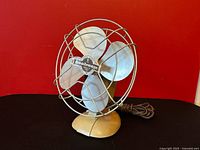 Oblique view of complete Seabreeze 6170-A fan showing base, cage, blades and cord