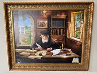 Full view of framed canvas print showing rabbi scene