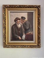 Full view of framed oil painting hanging on wall