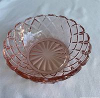 Top view of pink Depression glass bowl showing waffle pattern