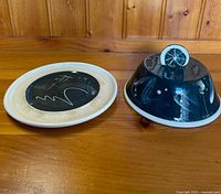 Plate base and domed lid upside down showing glaze patterns