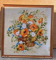 full view of framed crewel bouquet