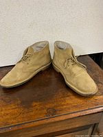 Both shoes side view on table