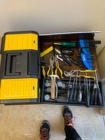 Top view of toolbox with all tools laid out