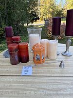 Overall view of all candles, holders, snuffer and turtle piece