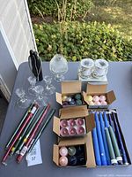 Overview of all candles, glass holders, figurine