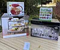 All four boxed items displayed together