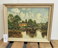 Front view of framed landscape painting