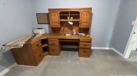 Overall view of solid oak L-shaped desk with hutch and drawers