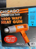 Front of box showing brand, wattage, temperature settings and product image