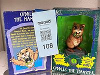 Front of box with figure visible