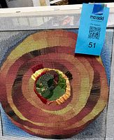 Front view of printed needlepoint canvas with partial stitching