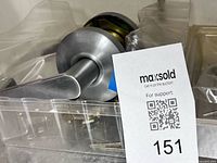 overall view of lever handle set in packaging with MaxSold tag