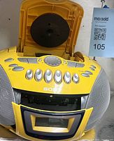Boombox front view with open CD lid and cassette door lowered