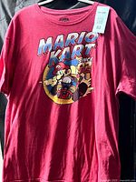 Full front view of red Mario Kart graphic t-shirt