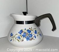 Front view showing floral pattern and overall shape