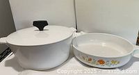 Casserole with lid and skillet side by side