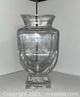 Full front view of clear crystal vase showing shape and base