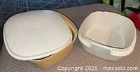 Nested stack cooker dishes with lid and separate white steamer basket