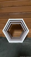 Front view nested hexagon shelves showing color gradation