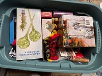 Top view into tote showing various new packaged items