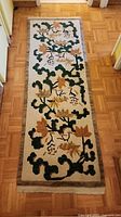 Full view of the Tibetan floral runner laid out on floor