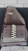 Full Tokai Gakki Chroma Harp showing strings, chord bars, and overall condition